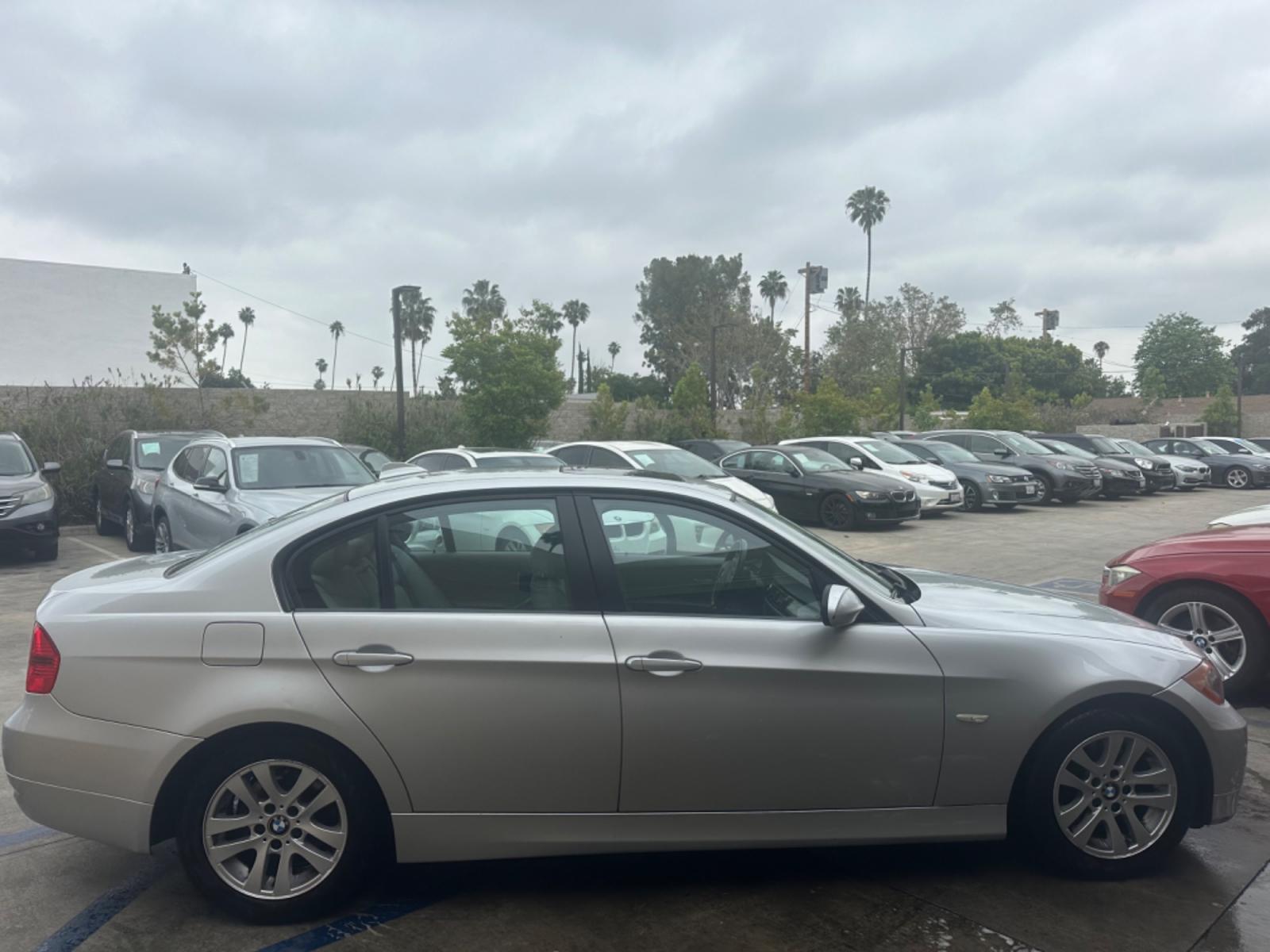 2007 Silver Metallic /Gray BMW 3-Series Leather (WBAVC53597F) with an 6 cylinder engine, Automatic transmission, located at 30 S. Berkeley Avenue, Pasadena, CA, 91107, (626) 248-7567, 34.145447, -118.109398 - Photo #4